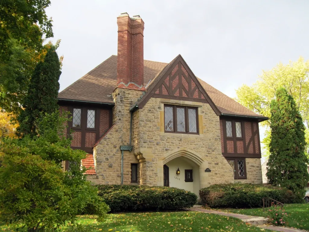 Stone and timber residence with a steep gabled roofline